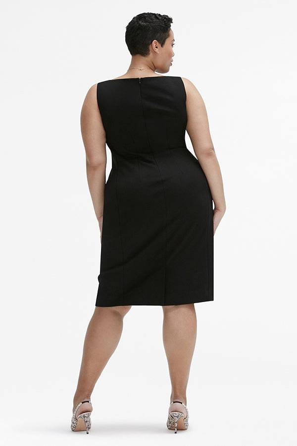 Back image of a woman standing wearing the Rachel dress in black | Plus Hover | Exclude