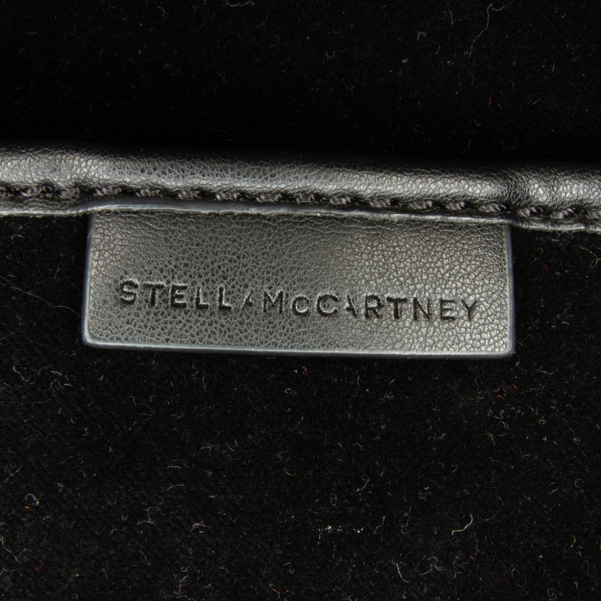 Stella McCartney | Pre-Owned Mini Crystal Monogram Round Crossbody | Black