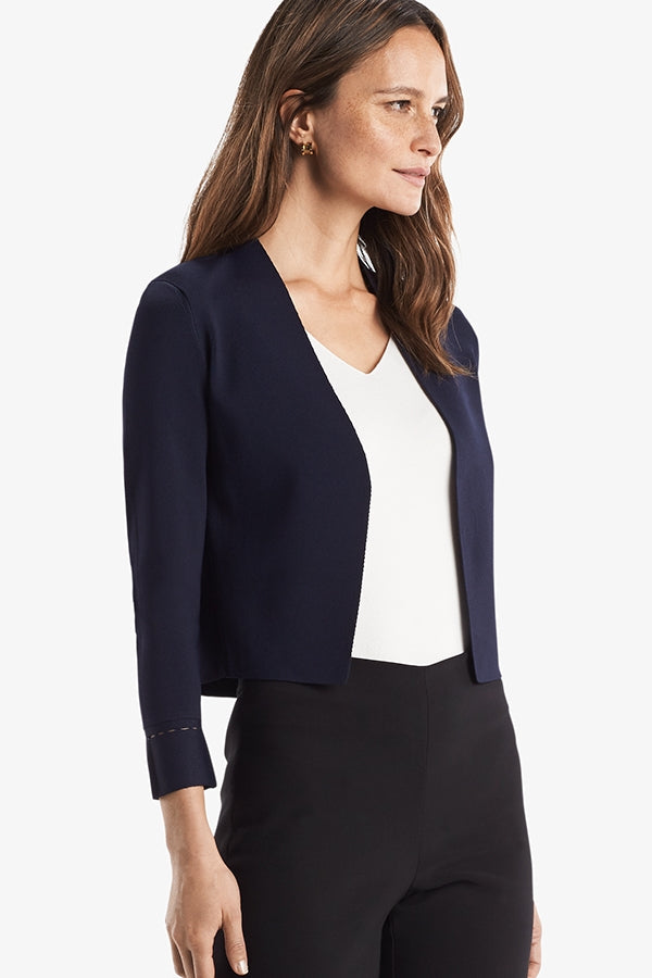 front image of a woman wearing the sant ambroeus jardigan in navy | Exclude