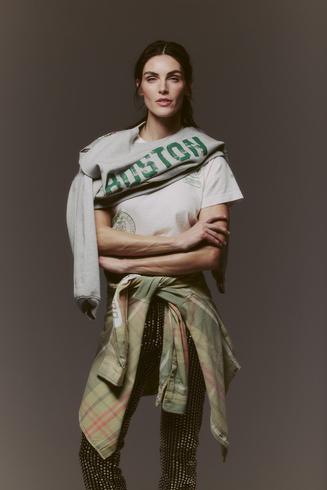 Woman wearing Sports Flannel - Celtics tied around waist with casual outfit