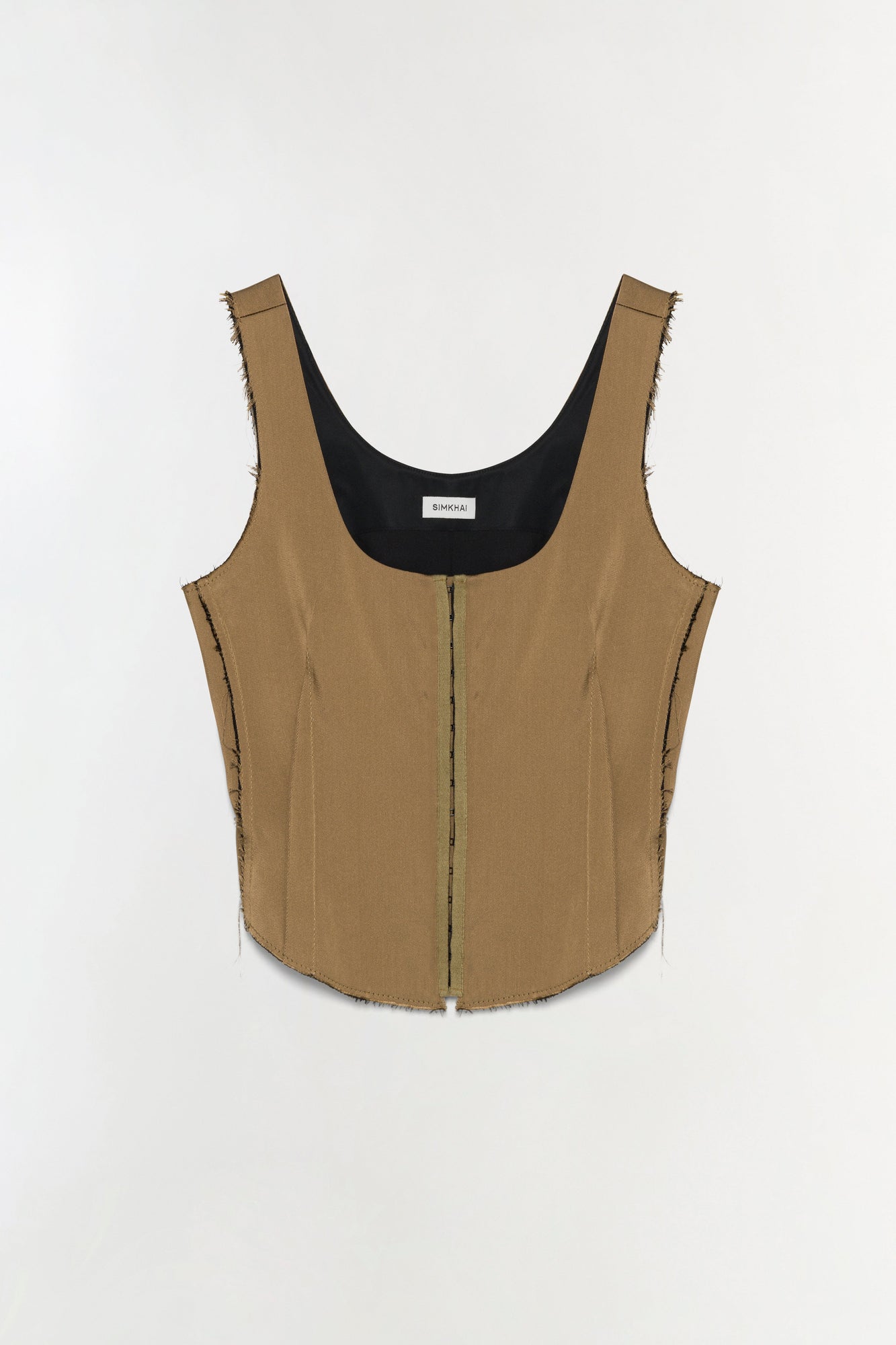 Tan bustier top with black lining, front zip closure, and raw edges on sleeveless straps and sides.