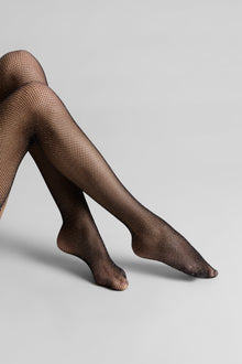 Lurex fishnet cut and curled stockings | Black