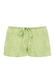 Pale green textured shorts with drawstring waist and floral quilted pattern throughout.
