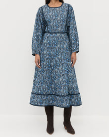 Ainsley Dress in quilted cotton with a blue paisley floral design and Marley Brown Suede Tall Boots.