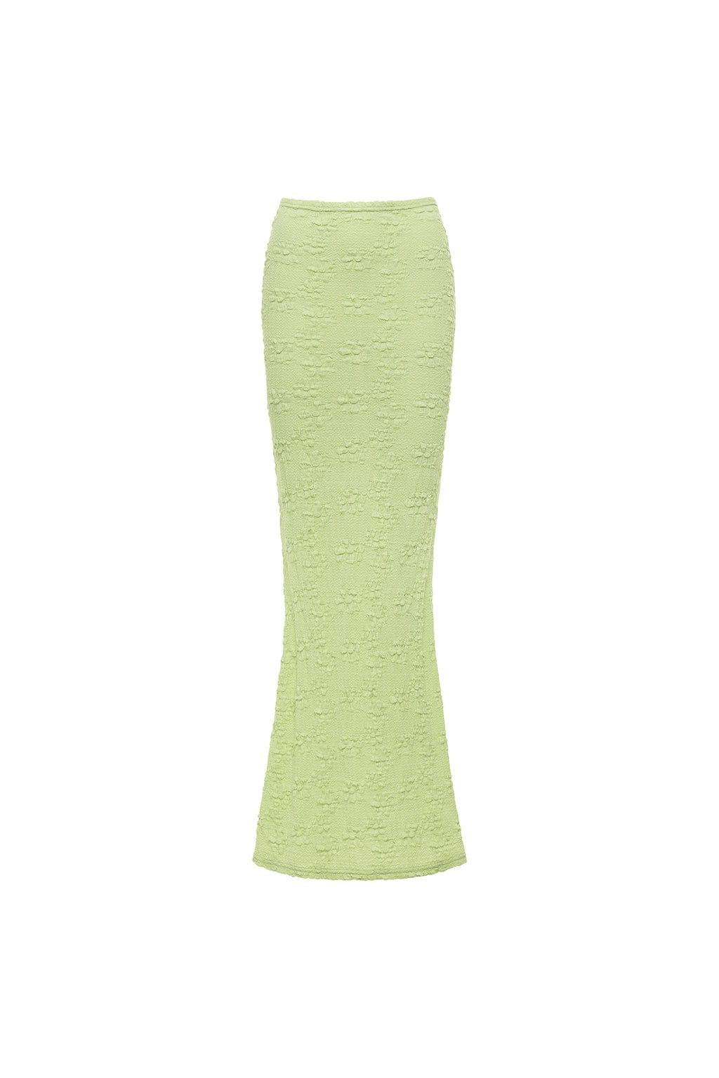 Lime green textured maxi skirt with floral embossed pattern and fitted silhouette.