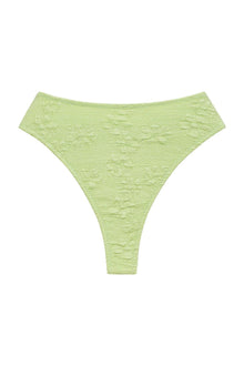 Lime green bikini bottom with textured floral jacquard pattern and high-cut thong style.