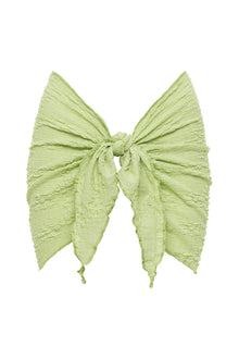 Light green sarong with textured fabric, tied at center with draped pointed ends.