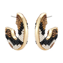 Black, Cream, and Bronze Beaded Aztec Hoop Earrings on Flat White Background
