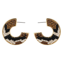 Black, Cream, and Bronze Beaded Aztec Hoop Earrings on Flat White Background