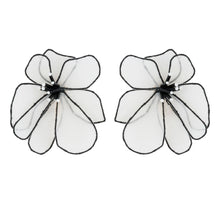 Black and White Embroidered Flower Earrings on Flat White Background