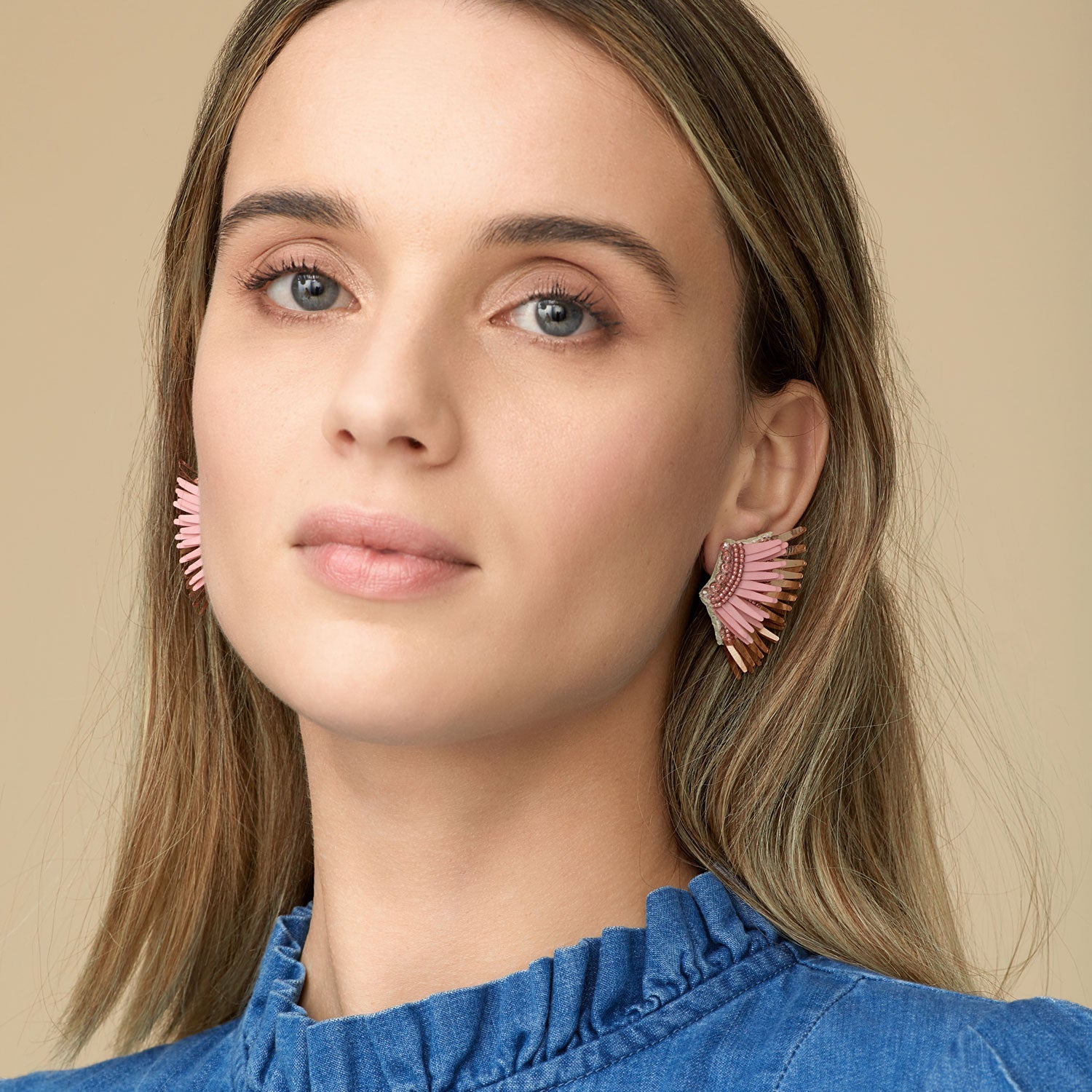 Blush and Rose Gold Sequin Wing Earrings on Model in Denim Shirt