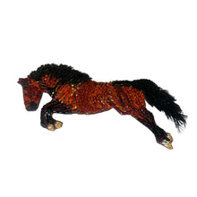 Brown and Black Beaded Horse Brooch On Flat White Background