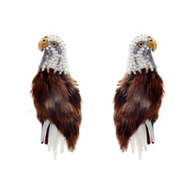 Brown and White Feather and Bead Eagle Stud Earrings on Flat White Background