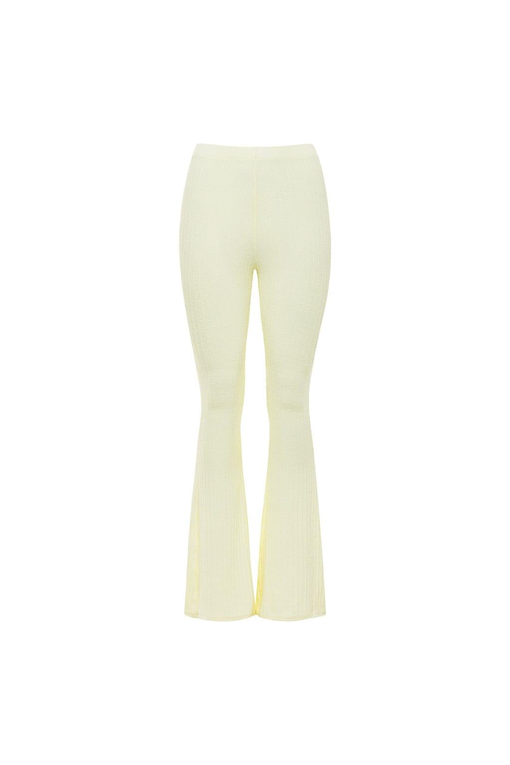 Cream ribbed flare pants with high waist and bell bottom legs.