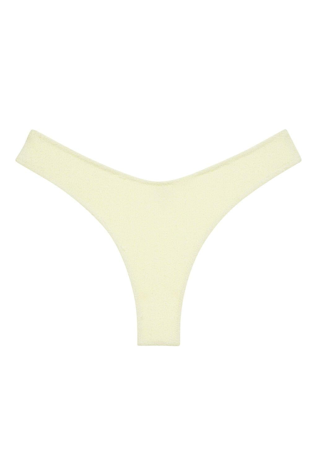 Buttercream ribbed bikini bottom with zig-zag stitching and wide leg openings.