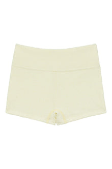 Cream-colored ribbed mini bike short with high waistband and visible seam detail at center front.