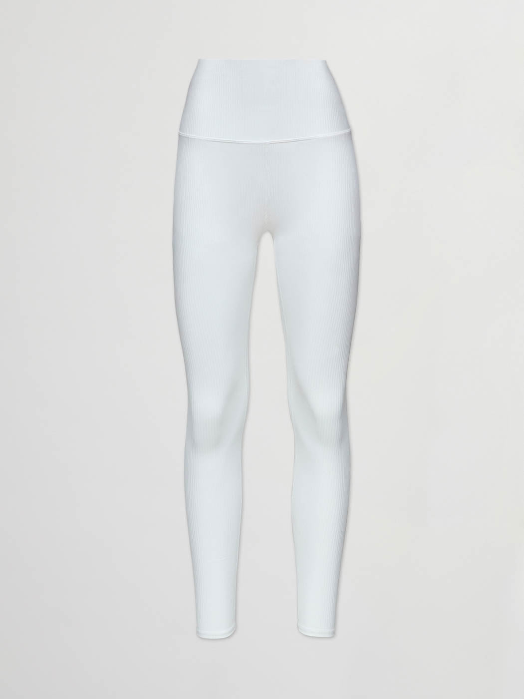Flat lay of Ribbed 7/8 leggings in white against neutral background.