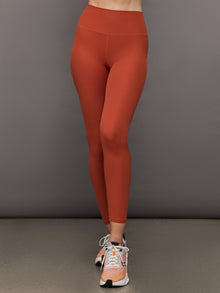 Women’s ribbed terracotta high-rise leggings, front view.