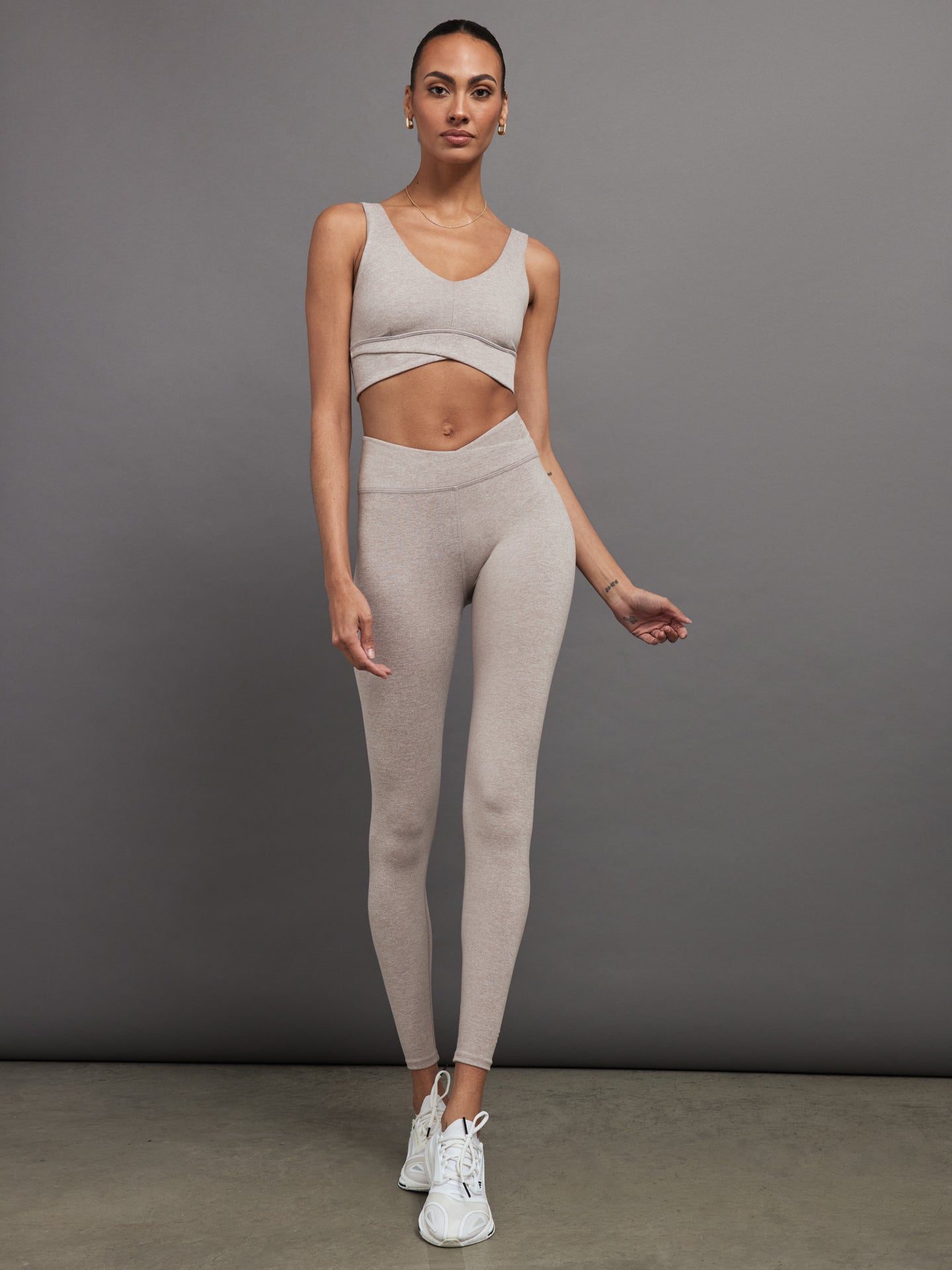 Full outfit view of Heather Melt wrap legging and matching wrap bra in heather oatmeal.