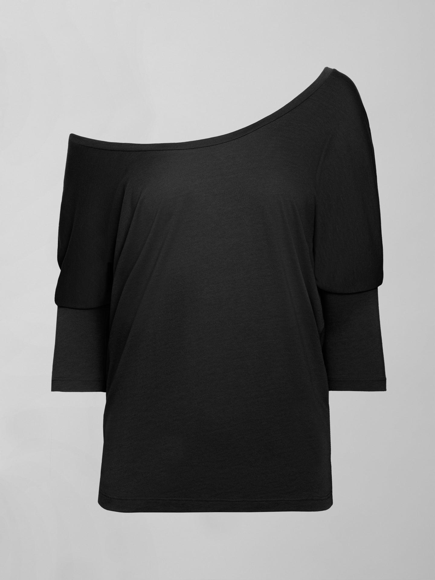Flat lay front view of Long Sleeve Off Shoulder Tee Black with relaxed fit silhouette.