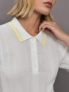 Model wears a lightweight and breathable polo tee shirt with yellow collar and sleeve details. 