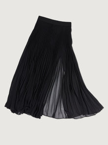 Flat lay of Mesh Pleated Sheer Skirt Black with pleated detailing and slit opening.
