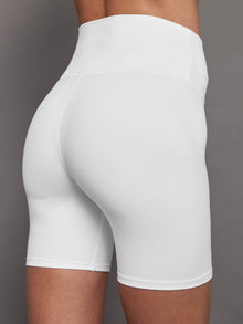Side angle close-up of Melt High-Rise Biker Shorts in White on model.