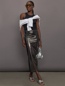 Model wears a silver-grey, semi-sheer mesh skirt with an elastic waistband.
