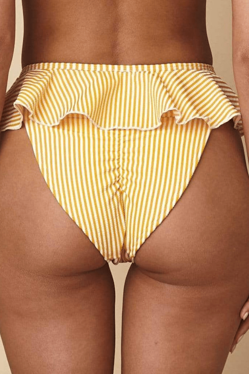 Yellow and white striped bikini bottom with ruffled edges at the leg openings.