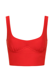 Red sleeveless tank top with curved neckline and seamed bust detail.
