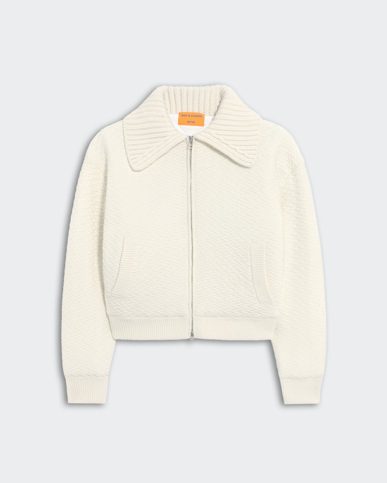 Cream textured heavyweight bomber jacket with chunky rib polo collar and front side pockets, insulated quilted lining