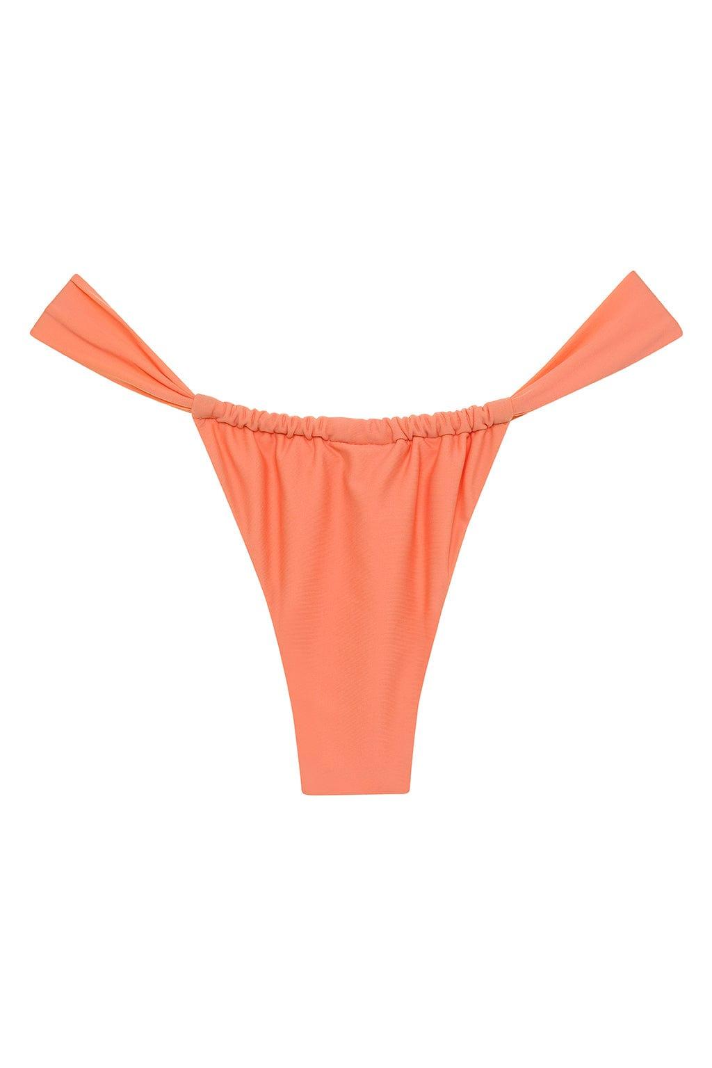 Coral bikini bottom with ruched waistband and tie-side straps.