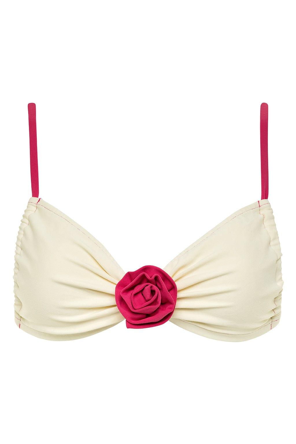 Cream bikini top with raspberry pink straps and a rose-shaped center detail.