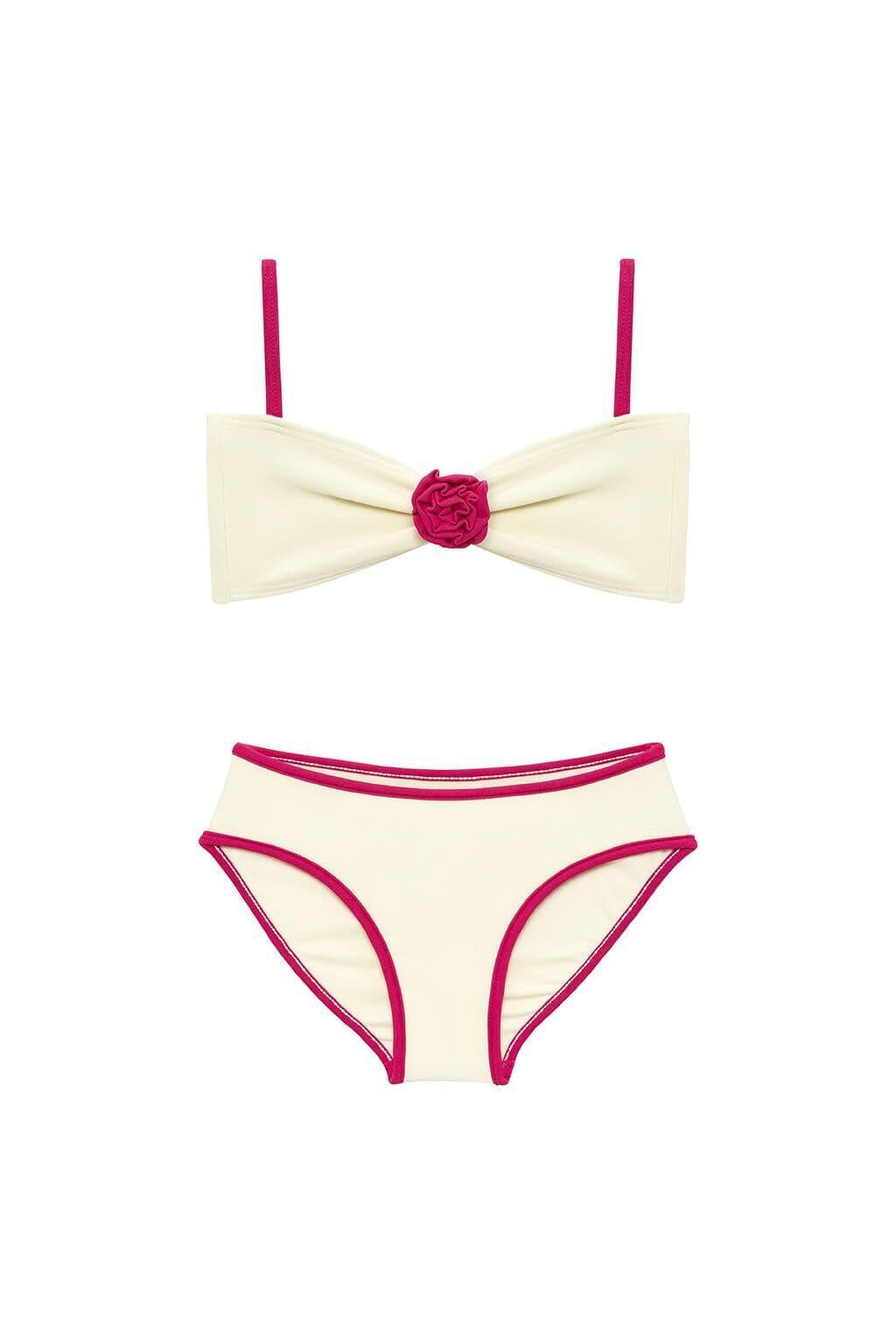 Cream and raspberry bikini set with bow-tie top featuring rosette center detail and matching bottoms with contrasting binding