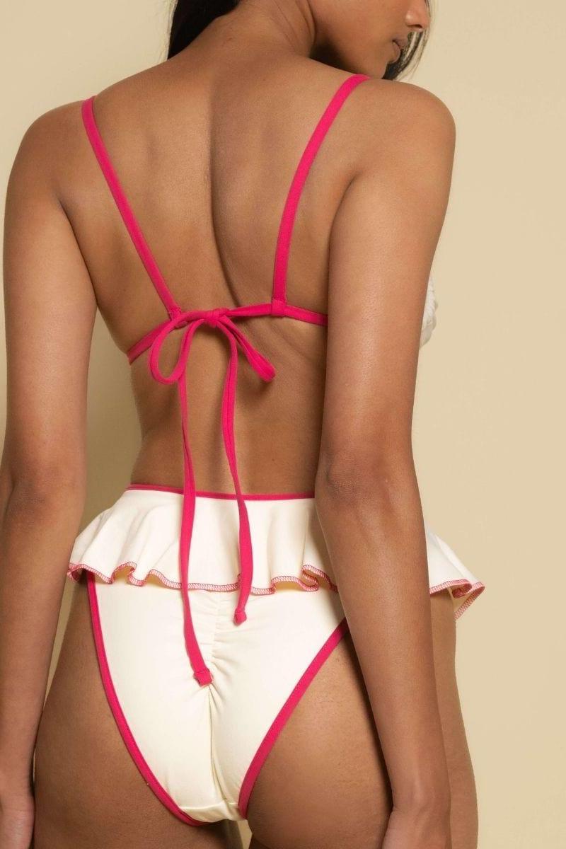 Cream and hot pink bikini top with thin straps and tie-back closure, shown from back view.