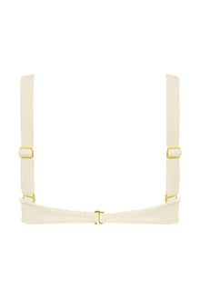 Cream ribbed bustier bikini top with gold hardware and adjustable straps.