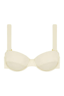 Cream ribbed bustier bikini top with underwire cups and adjustable shoulder straps.