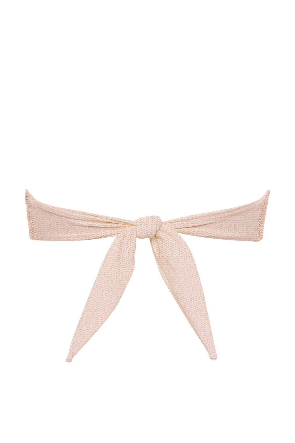 Cream bandeau bikini top with textured fabric and tie-front closure.