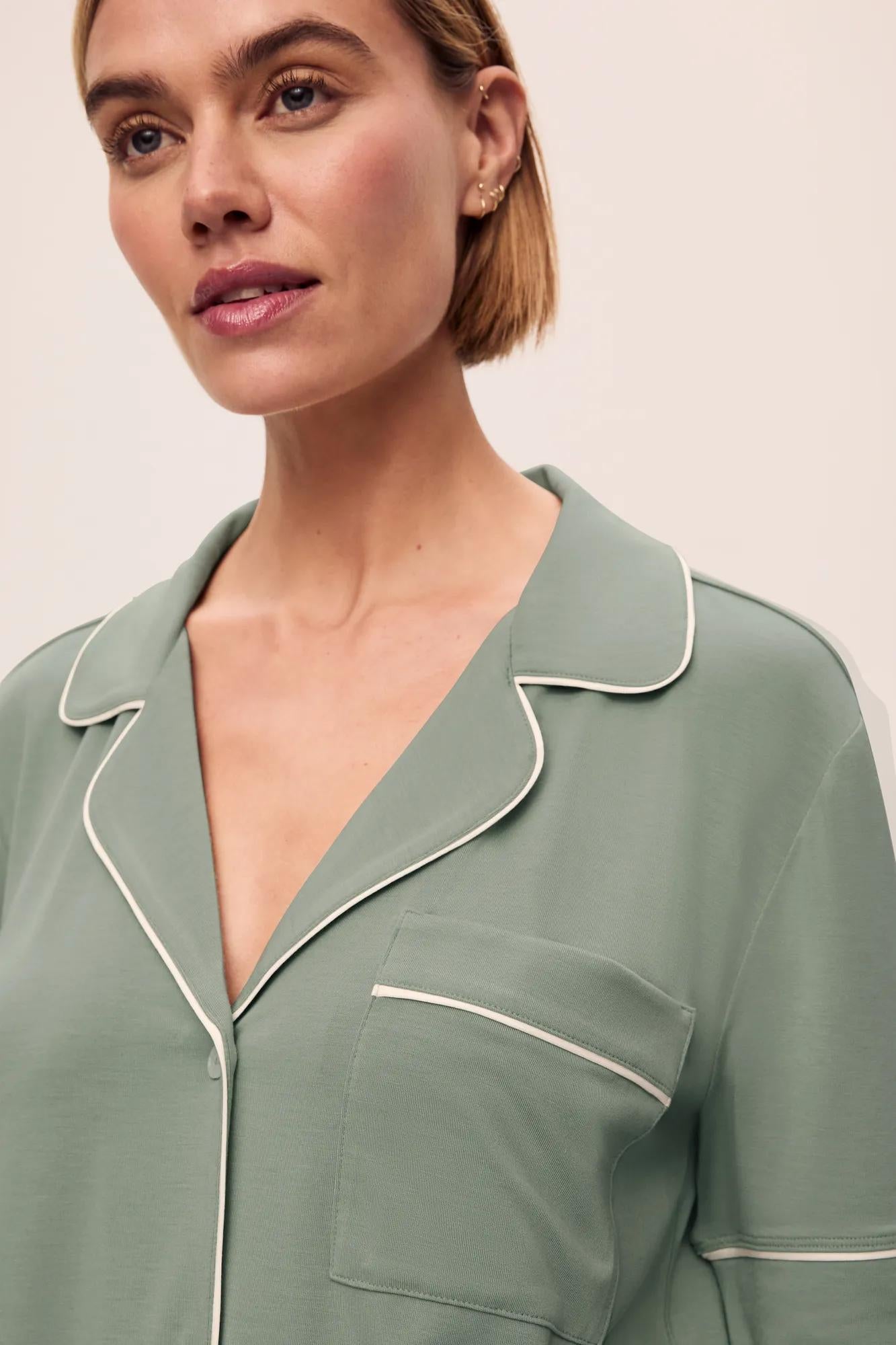Model is wearing Gisele TENCEL Modal Short Sleeve & Pant PJ Set in Eucalyptus/Ivory