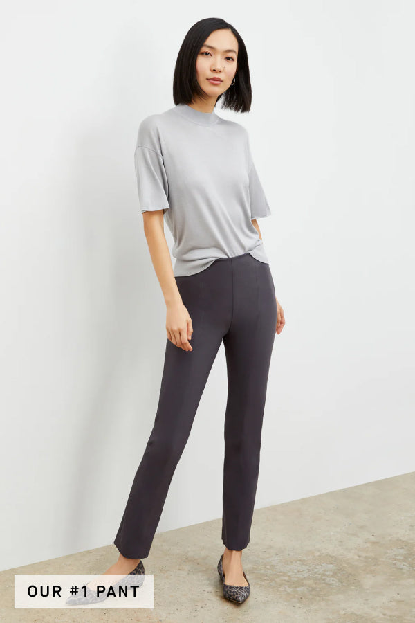 Side image of a woman standing wearing the foster pant in monsoon | Grid | Exclude