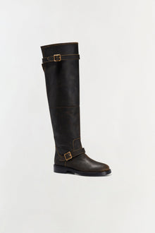 Black leather over-the-knee boot with buckle straps and contrast stitching detail.