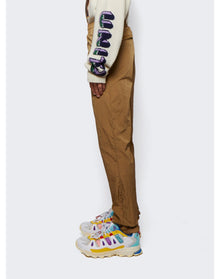 Givenchy | Men | 4g Embroidered Gar t Dye Trackpants | Camel Beige