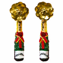Gold, Red, Green, Black, and White Beaded Champagne Bottle Drop Earrings on Flat White Background