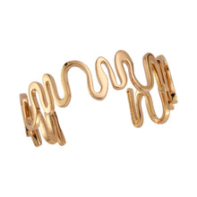 Gold Cuff Bracelet on Flat White Background