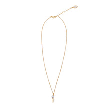 Gold and Pearl Golf Tee Necklace on Flat White Background