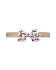 The Girls Twill Hair Bows in Petite Petals by Petite Plume, a beige elastic headband with a white fabric bow decorated with pink roses and green leaves, is the perfect pajamas accessory for girls.