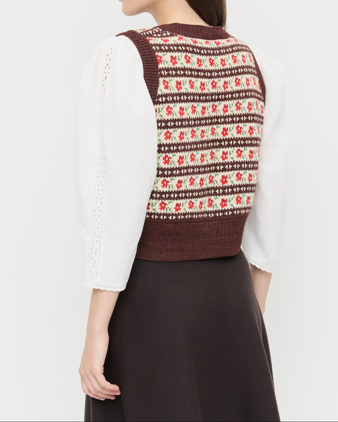 Heather Sweater Vest in brown and red intarsia floral, Felicity Blouse in cream cotton, and Tansy Suede Skirt in brown suede.