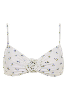 White bikini top with small blue and yellow floral print and center rosette detail.