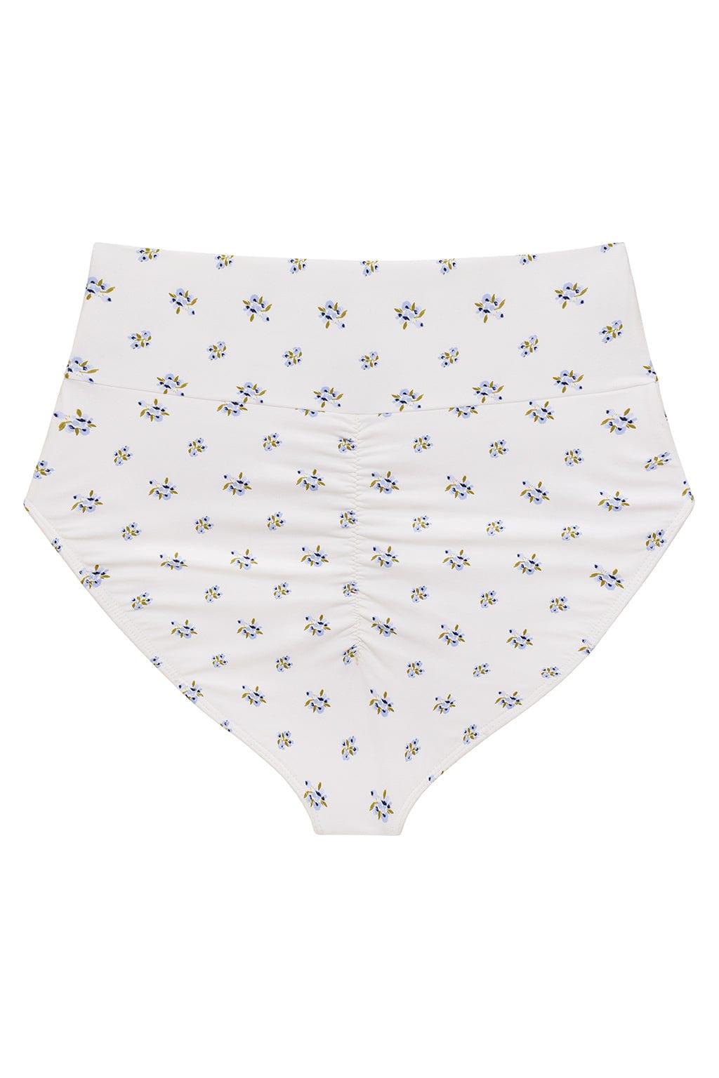 White bikini bottom with small blue and yellow floral print throughout and high-rise waistband.