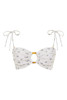 White bandeau bikini top with small multicolored floral print and tortoiseshell ring detail, featuring adjustable neck ties.